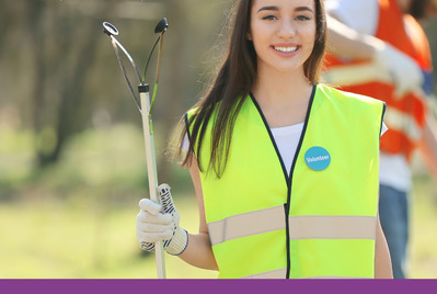 Someone holding a litter picker for Litter Picking Week