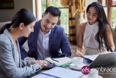 Three people having a meeting