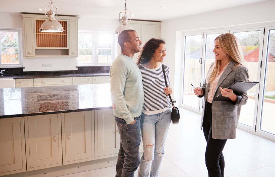 Three people viewing a house