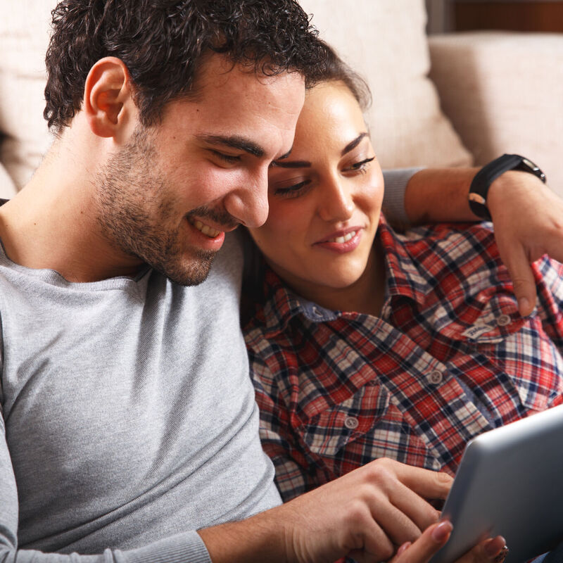 Couple viewing a property remotely