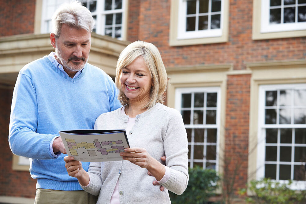 Couple looking at property details