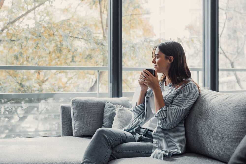 A woman sitting on a sofa