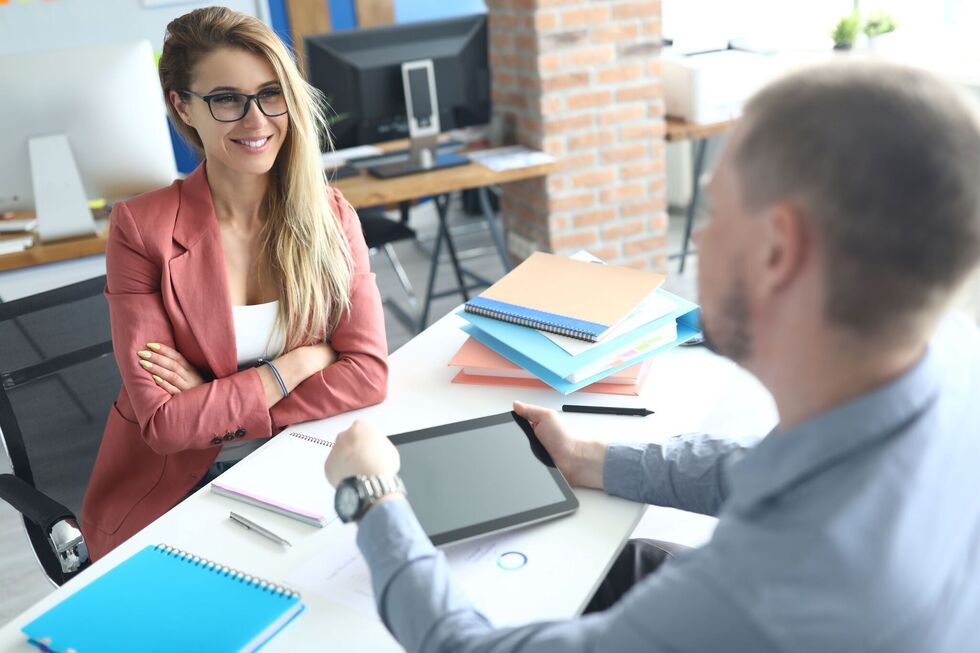 Two collages having a work meeting