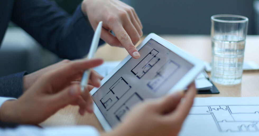 Looking at floorplans on tablet 