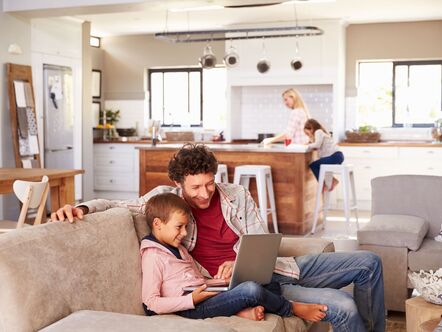 Happy family together in a family room