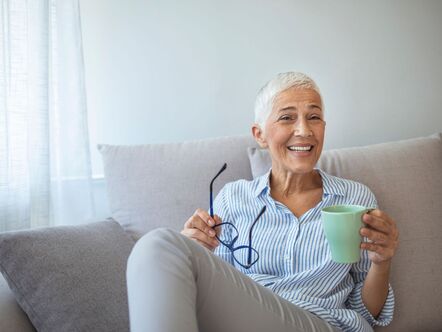 Happy lady on a couch